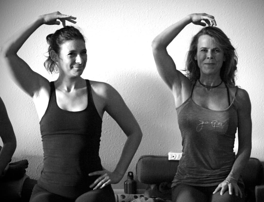 Students practicing together at Ashtanga Yoga Denver