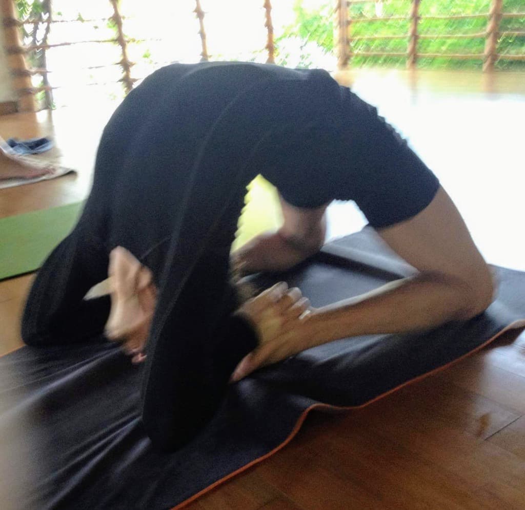 William practicing Kapotasana - deep backbend from Intermediate Series